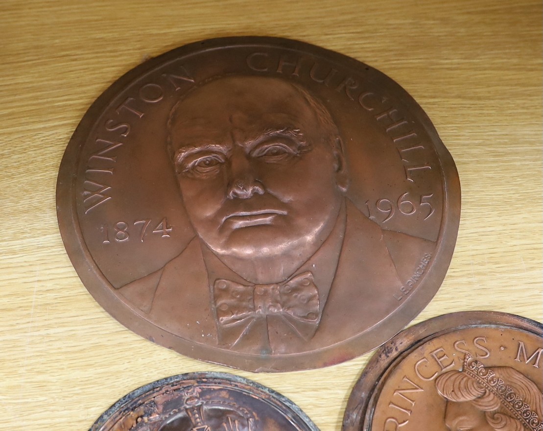 A group of six various cast copper or bronze medallion roundels. Largest 28cm diameter